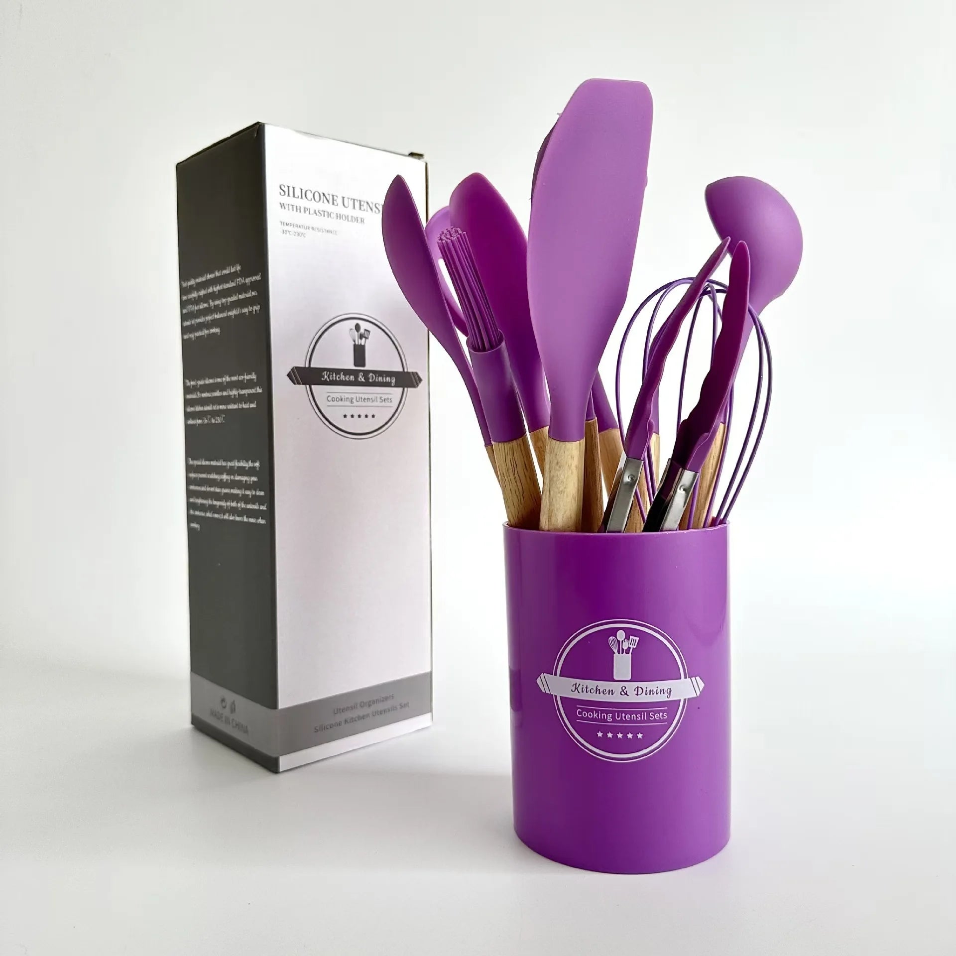 Set de utensilios ecológicos de 12 piezas con asas de madera y pala de silicona.