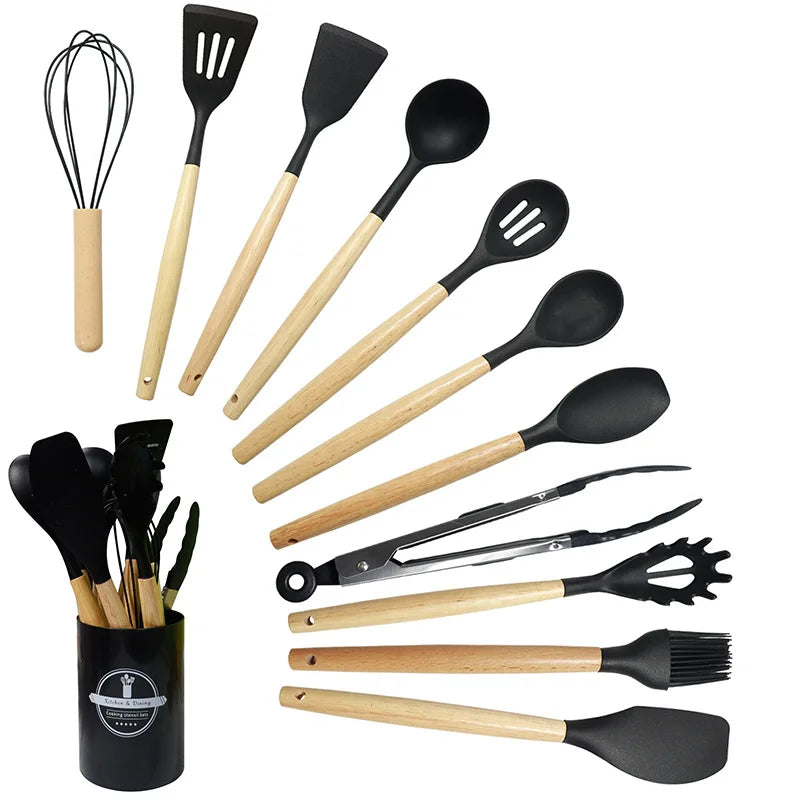 Set de utensilios ecológicos de 12 piezas con asas de madera y pala de silicona.