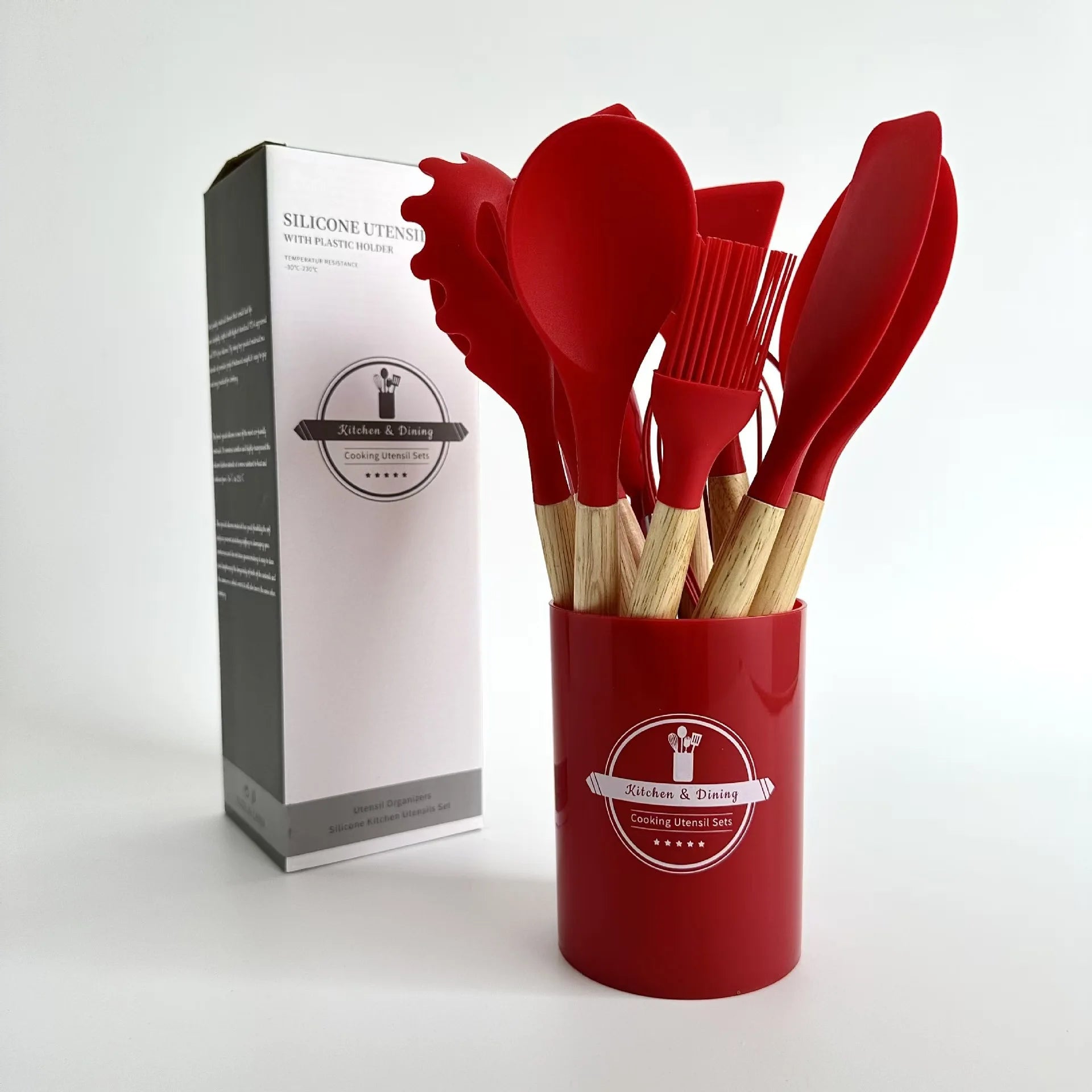 Set de utensilios ecológicos de 12 piezas con asas de madera y pala de silicona.