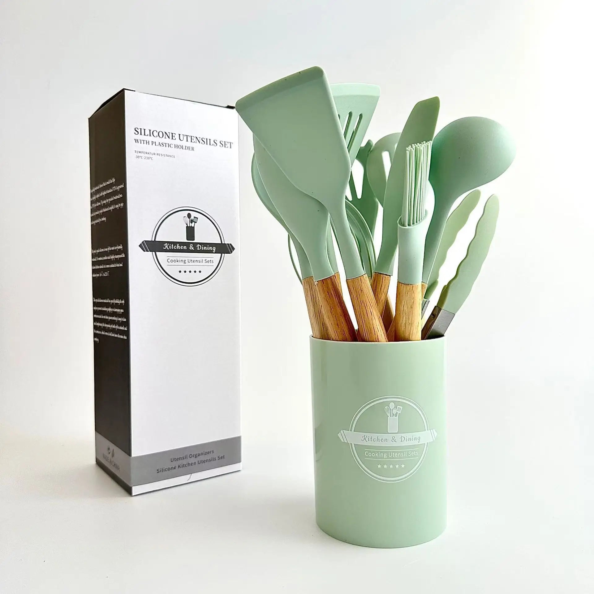 Set de utensilios ecológicos de 12 piezas con asas de madera y pala de silicona.